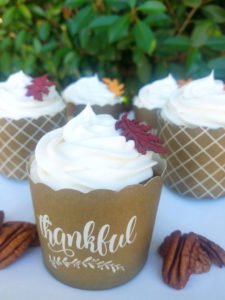 These Spice Cupcakes with Maple Pecan Cream Cheese Icing are divine and your Thanksgiving or fall party guests will agree! This homemade, easy fall cupcake can be topped with a liqueur infused icing or a kid friendly icing - find both in this recipe. #Thanksgiving #Thanksgivingrecipes #fallrecipes #holidaybaking #holidayrecipes #cupcakes