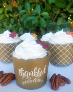 These Spice Cupcakes with Maple Pecan Cream Cheese Icing are divine and your Thanksgiving or fall party guests will agree! This homemade, easy fall cupcake can be topped with a liqueur infused icing or a kid friendly icing - find both in this recipe. #Thanksgiving #Thanksgivingrecipes #fallrecipes #holidaybaking #holidayrecipes #cupcakes