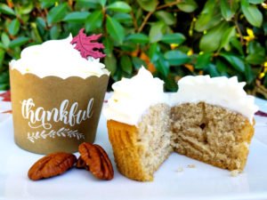 These Spice Cupcakes with Maple Pecan Cream Cheese Icing are divine and your Thanksgiving or fall party guests will agree! This homemade, easy fall cupcake can be topped with a liqueur infused icing or a kid friendly icing - find both in this recipe. #Thanksgiving #Thanksgivingrecipes #fallrecipes #holidaybaking #holidayrecipes #cupcakes