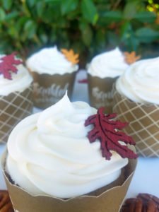 These Spice Cupcakes with Maple Pecan Cream Cheese Icing are divine and your Thanksgiving or fall party guests will agree! This homemade, easy fall cupcake can be topped with a liqueur infused icing or a kid friendly icing - find both in this recipe. #Thanksgiving #Thanksgivingrecipes #fallrecipes #holidaybaking #holidayrecipes #cupcakes