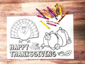 Want to set a fun Thanksgiving kids table with an easy centerpiece and a free printable coloring turkey placemat? We've made it easy with these table setting ideas, decorations and centerpiece decorated with thankful fall leaf printables! Click to see the details! #Thanksgiving #thanksgivingtable #parties365