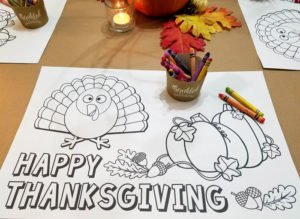 Want to set a fun Thanksgiving kids table with an easy centerpiece and a free printable coloring turkey placemat? We've made it easy with these table setting ideas, decorations and centerpiece decorated with thankful fall leaf printables! Click to see the details! #Thanksgiving #thanksgivingtable #parties365