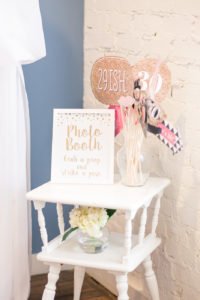Are you turning 30 or planning a milestone 30th birthday party and need ideas or themes? We have a sweet and classy party for her complete with gold decorations, a photo booth and a dessert table to inspire your event! #30thbirthday #30th #partyideas #birthday