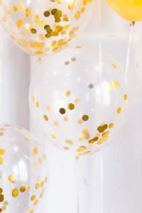 Are you turning 30 or planning a milestone 30th birthday party and need ideas or themes? We have a sweet and classy party for her complete with gold decorations, a photo booth and a dessert table to inspire your event! #30thbirthday #30th #partyideas #birthday