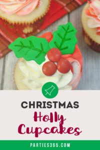Looking for Christmas Cupcake ideas for the holidays? Our Holly Cupcake Recipe is a fancy dessert that's still easy to make! The cute fondant leaves and M&M berries really stand out on the candy cane inspired frosting. Click for the full recipe! #holidaybaking #holidayrecipes #Christmas