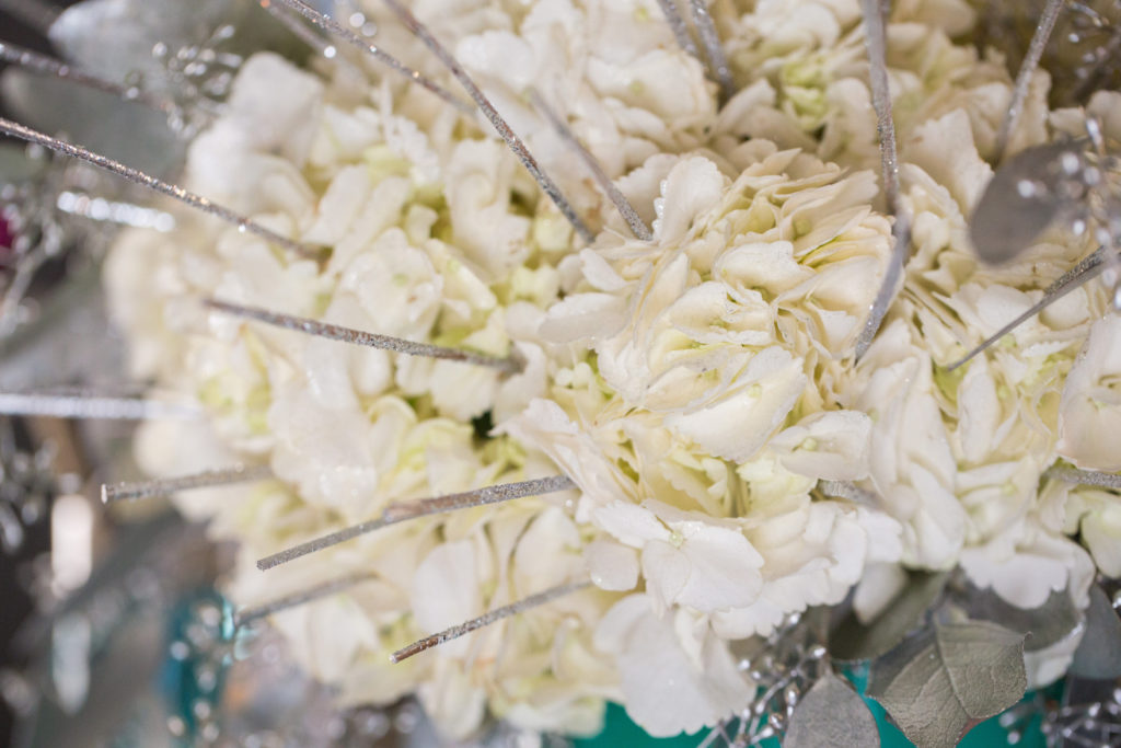 white and silver floral arrangement