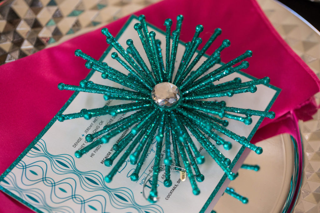 teal christmas star ornament on place setting