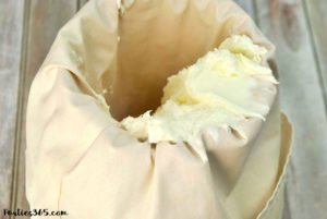 Looking for Christmas Cupcake ideas for the holidays? Our Holly Cupcake Recipe is a fancy dessert that's still easy to make! The cute fondant leaves and M&M berries really stand out on the candy cane inspired frosting. Click for the full recipe! #holidaybaking #holidayrecipes #Christmas