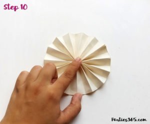 This cute DIY paper unicorn ornament for Christmas will look adorable on the tree and is fun for all ages! Our tutorial and printable template will show you how to make the ornaments - let the glitter and creativity run wild! #Christmascraft #unicorns #printable #crafts