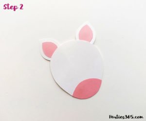 This cute DIY paper unicorn ornament for Christmas will look adorable on the tree and is fun for all ages! Our tutorial and printable template will show you how to make the ornaments - let the glitter and creativity run wild! #Christmascraft #unicorns #printable #crafts