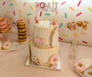 A donut themed party is a sweet idea for a 1st birthday, baby shower or girls birthday party! Check out this Donut Grow Up party for some decorations, food, cake and other theme ideas! #firstbirthday #donuts #donutparty #birthday
