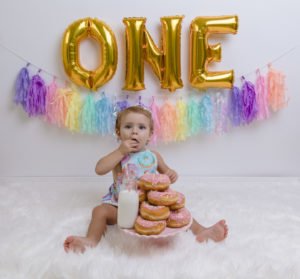 A donut themed party is a sweet idea for a 1st birthday, baby shower or girls birthday party! Check out this Donut Grow Up party for some decorations, food, cake and other theme ideas! #firstbirthday #donuts #donutparty #birthday