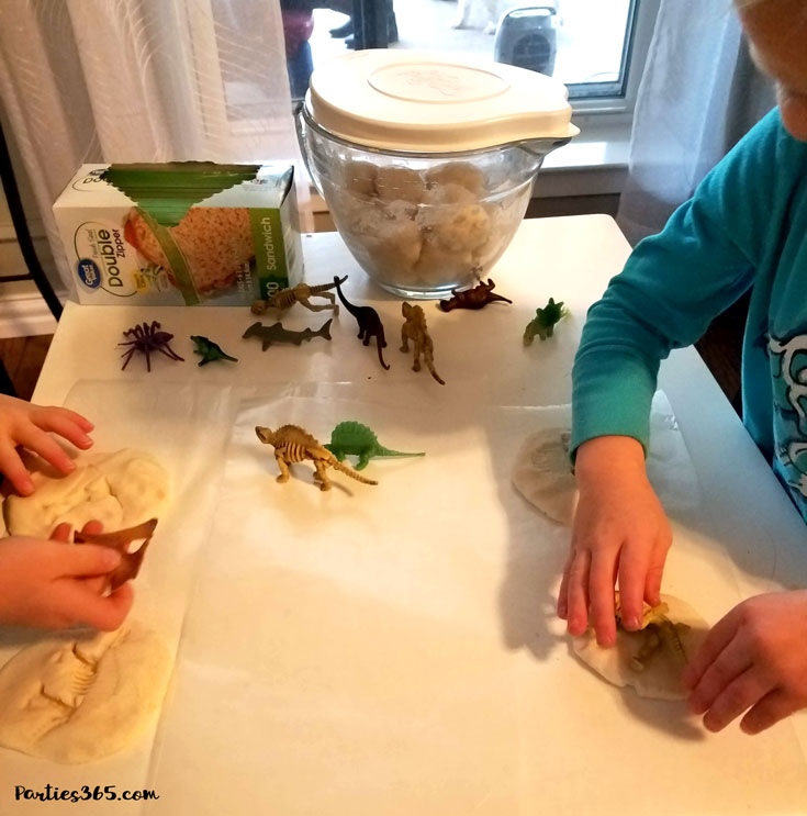 children making dinosaur salt dough fossils