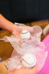 Want a fun and creative gender reveal theme for your party? How about a Diamonds (baseball) or Diamonds (jewel) party? This Home Run gender reveal with exploding baseball is a unique way to share your big news! #genderreveal #babyshower #partysupplies #baseball