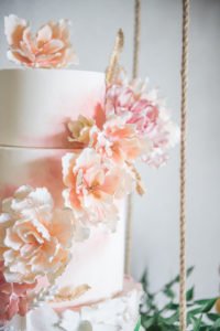 Spring and summer are wonderful times of year to throw a birthday party or shower and this dessert table is your inspiration for an elegant enchanted garden party! With so many ideas for decorations, food, flowers, desserts and cake, this indoor garden party is a must see! #gardenparty #spring #summer #partyideas