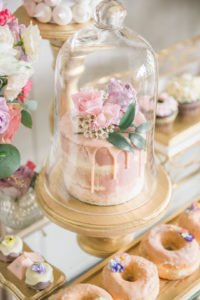 Spring and summer are wonderful times of year to throw a birthday party or shower and this dessert table is your inspiration for an elegant enchanted garden party! With so many ideas for decorations, food, flowers, desserts and cake, this indoor garden party is a must see! #gardenparty #spring #summer #partyideas