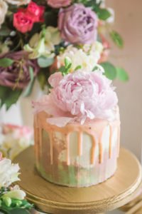 Spring and summer are wonderful times of year to throw a birthday party or shower and this dessert table is your inspiration for an elegant enchanted garden party! With so many ideas for decorations, food, flowers, desserts and cake, this indoor garden party is a must see! #gardenparty #spring #summer #partyideas