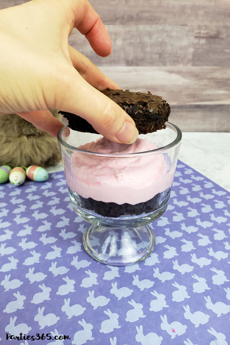 Want a fun Easter dessert idea for the kids or your desserts table? This easy homemade Easter Bunny Brownie Trifle with White Chocolate Mousse Recipe is cute, creative and delicious! #Easter #Easterrecipe #Easterdessert