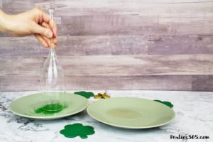 This festive St. Patrick's Day champagne cocktail is a fun and easy drink idea for your party! The simple recipe with sparkling wine, isn't green, but the gold under the rainbow will delight any St. Pattys leprechaun! #stpatricksday #champagne #cocktailrecipe #rainbow