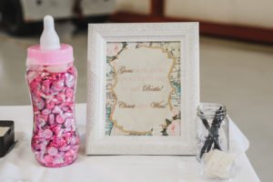 A travel themed baby shower is a perfect idea as the adventure into parenthood begins! Get ideas from vintage maps to custom invitations, favors, decorations and even creative food in this beautiful baby shower held in an airplane hanger! #babyshower #travel #adventuretheme #partyideas