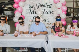 A travel themed baby shower is a perfect idea as the adventure into parenthood begins! Get ideas from vintage maps to custom invitations, favors, decorations and even creative food in this beautiful baby shower held in an airplane hanger! #babyshower #travel #adventuretheme #partyideas