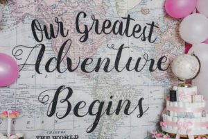 A travel themed baby shower is a perfect idea as the adventure into parenthood begins! Get ideas from vintage maps to custom invitations, favors, decorations and even creative food in this beautiful baby shower held in an airplane hanger! #babyshower #travel #adventuretheme #partyideas