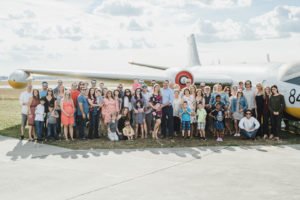 A travel themed baby shower is a perfect idea as the adventure into parenthood begins! Get ideas from vintage maps to custom invitations, favors, decorations and even creative food in this beautiful baby shower held in an airplane hanger! #babyshower #travel #adventuretheme #partyideas