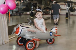 A travel themed baby shower is a perfect idea as the adventure into parenthood begins! Get ideas from vintage maps to custom invitations, favors, decorations and even creative food in this beautiful baby shower held in an airplane hanger! #babyshower #travel #adventuretheme #partyideas