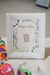 A travel themed baby shower is a perfect idea as the adventure into parenthood begins! Get ideas from vintage maps to custom invitations, favors, decorations and even creative food in this beautiful baby shower held in an airplane hanger! #babyshower #travel #adventuretheme #partyideas