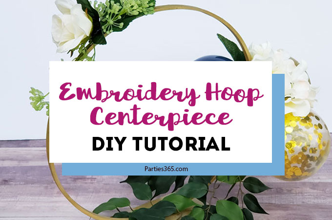 This unique DIY centerpiece, made from an Embroidery Hoop, flowers and mini balloons, is perfect for a party, birthday, wedding, graduation or anniversary! This simple crafts project tutorial will show you how to create beautiful decor for your big event! #centerpiece #embroideryhoop #partydecor #partyideas