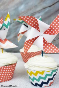 This pinwheel theme for a Sweet Shoppe is full of printable designs to make your birthday party pop! With ideas for decorations, favors, cupcake toppers, signs and more, you'll definitely want to download this free printable party set! #pinwheel #sweetshoppe #printables #partyideas