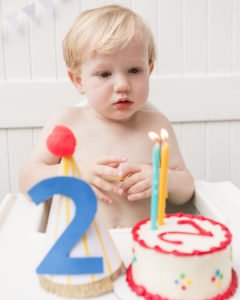 Need ideas for a toddler birthday party theme this summer? Check out this adorable 2 year old birthday pool party for 4 friends turning two! Perfect for kids, it's full of ideas for decorations, cake, food and the primary colors work great for girls or boys! #poolparty #summerfun #birthdayparty #twoyearsold #partyideas