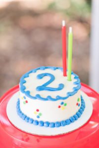 Need ideas for a toddler birthday party theme this summer? Check out this adorable 2 year old birthday pool party for 4 friends turning two! Perfect for kids, it's full of ideas for decorations, cake, food and the primary colors work great for girls or boys! #poolparty #summerfun #birthdayparty #twoyearsold #partyideas