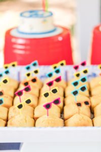 Need ideas for a toddler birthday party theme this summer? Check out this adorable 2 year old birthday pool party for 4 friends turning two! Perfect for kids, it's full of ideas for decorations, cake, food and the primary colors work great for girls or boys! #poolparty #summerfun #birthdayparty #twoyearsold #partyideas