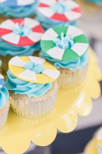 Need ideas for a toddler birthday party theme this summer? Check out this adorable 2 year old birthday pool party for 4 friends turning two! Perfect for kids, it's full of ideas for decorations, cake, food and the primary colors work great for girls or boys! #poolparty #summerfun #birthdayparty #twoyearsold #partyideas