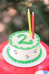 Need ideas for a toddler birthday party theme this summer? Check out this adorable 2 year old birthday pool party for 4 friends turning two! Perfect for kids, it's full of ideas for decorations, cake, food and the primary colors work great for girls or boys! #poolparty #summerfun #birthdayparty #twoyearsold #partyideas
