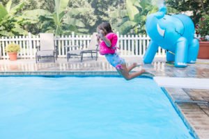 Need ideas for a toddler birthday party theme this summer? Check out this adorable 2 year old birthday pool party for 4 friends turning two! Perfect for kids, it's full of ideas for decorations, cake, food and the primary colors work great for girls or boys! #poolparty #summerfun #birthdayparty #twoyearsold #partyideas