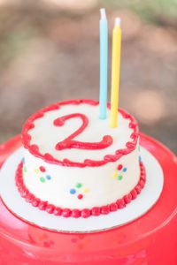 Need ideas for a toddler birthday party theme this summer? Check out this adorable 2 year old birthday pool party for 4 friends turning two! Perfect for kids, it's full of ideas for decorations, cake, food and the primary colors work great for girls or boys! #poolparty #summerfun #birthdayparty #twoyearsold #partyideas