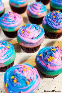 Want an easy idea for a DIY Mermaid Cupcake? This simple Under the Sea theme birthday cupcake is inspired by mermaid magic! We'll show you how to make them and give you ideas for cute toppers! #mermaidcupcake #mermaidparty #underthesea #cupcakes #partyideas
