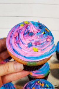 Want an easy idea for a DIY Mermaid Cupcake? This simple Under the Sea theme birthday cupcake is inspired by mermaid magic! We'll show you how to make them and give you ideas for cute toppers! #mermaidcupcake #mermaidparty #underthesea #cupcakes #partyideas
