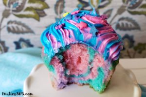 Want an easy idea for a DIY Mermaid Cupcake? This simple Under the Sea theme birthday cupcake is inspired by mermaid magic! We'll show you how to make them and give you ideas for cute toppers! #mermaidcupcake #mermaidparty #underthesea #cupcakes #partyideas