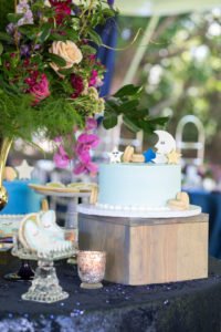 Looking for the perfect baby shower theme? An Over the Moon shower lends itself to so many great ideas for a baby girl or boy! Check out this darling Over the Moon shower for ideas for invitations, food, decorations and other themed products to make yours a shower to remember! #overthemoon #babyshower #babyshowerideas #babyshowerthemes