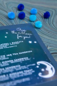 Looking for the perfect baby shower theme? An Over the Moon shower lends itself to so many great ideas for a baby girl or boy! Check out this darling Over the Moon shower for ideas for invitations, food, decorations and other themed products to make yours a shower to remember! #overthemoon #babyshower #babyshowerideas #babyshowerthemes