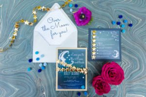 Looking for the perfect baby shower theme? An Over the Moon shower lends itself to so many great ideas for a baby girl or boy! Check out this darling Over the Moon shower for ideas for invitations, food, decorations and other themed products to make yours a shower to remember! #overthemoon #babyshower #babyshowerideas #babyshowerthemes