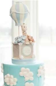 This Up, Up and Away hot air balloon themed baby shower is full of adorable decoration ideas for your party! This adventure inspired gender neutral theme will work for baby boys or girls, and is full inspiration for decor, favors, the cake and more! #babyshower #hotairballoon #upupandaway #babyshowerideas