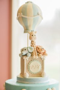 This Up, Up and Away hot air balloon themed baby shower is full of adorable decoration ideas for your party! This adventure inspired gender neutral theme will work for baby boys or girls, and is full inspiration for decor, favors, the cake and more! #babyshower #hotairballoon #upupandaway #babyshowerideas