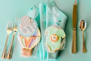 This Up, Up and Away hot air balloon themed baby shower is full of adorable decoration ideas for your party! This adventure inspired gender neutral theme will work for baby boys or girls, and is full inspiration for decor, favors, the cake and more! #babyshower #hotairballoon #upupandaway #babyshowerideas