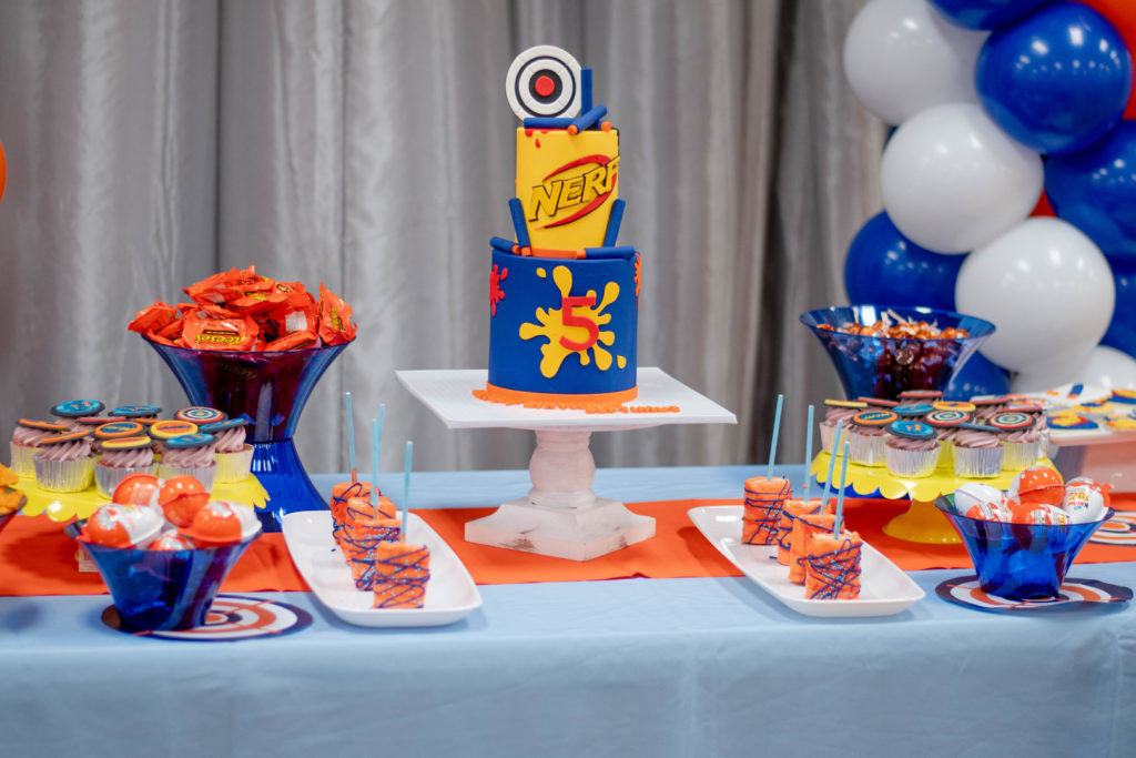 nerf gun birthday party dessert table and cake