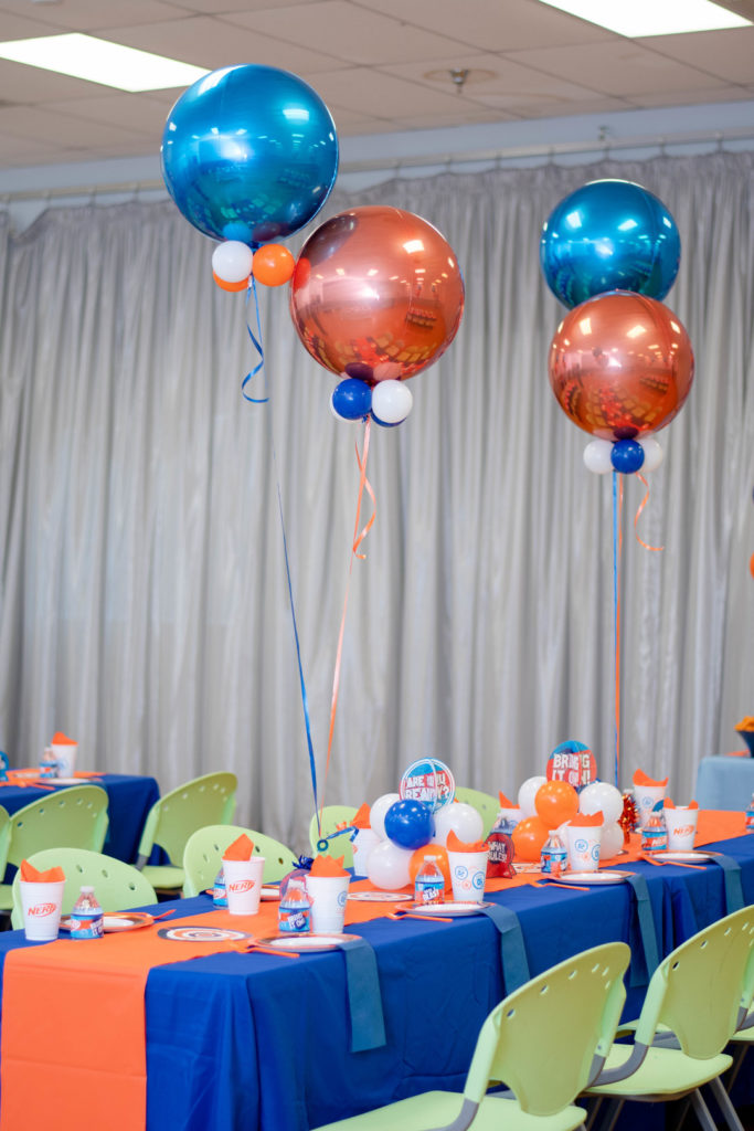 nurf gun birthday party tables with balloons