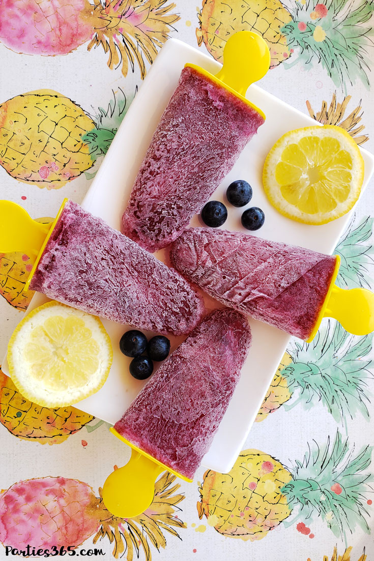 frozen red wine sangria popsicles with lemons and blueberries